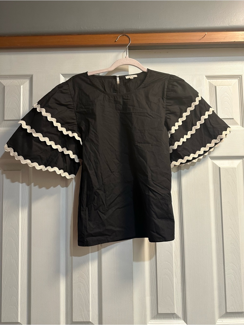 JODIFL Black Puff Sleeve Top with White Ric-Rac Trim
